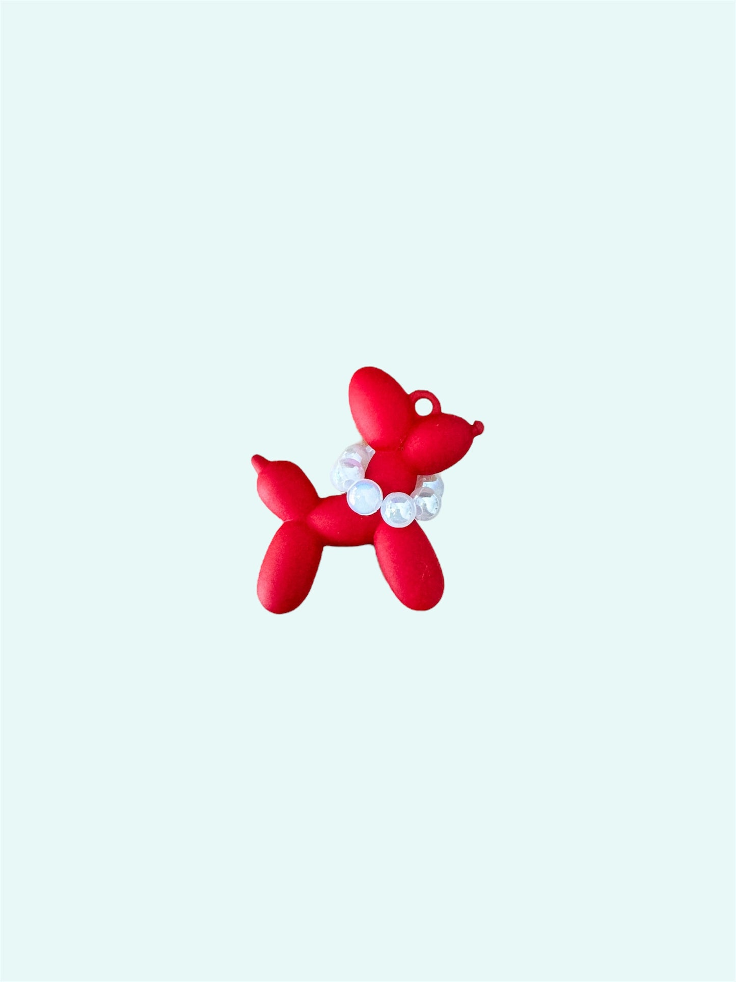 Mini acrylic balloon dog keychain with clear elegant design, lightweight and portable, reflecting the joy and love shared with your dog.