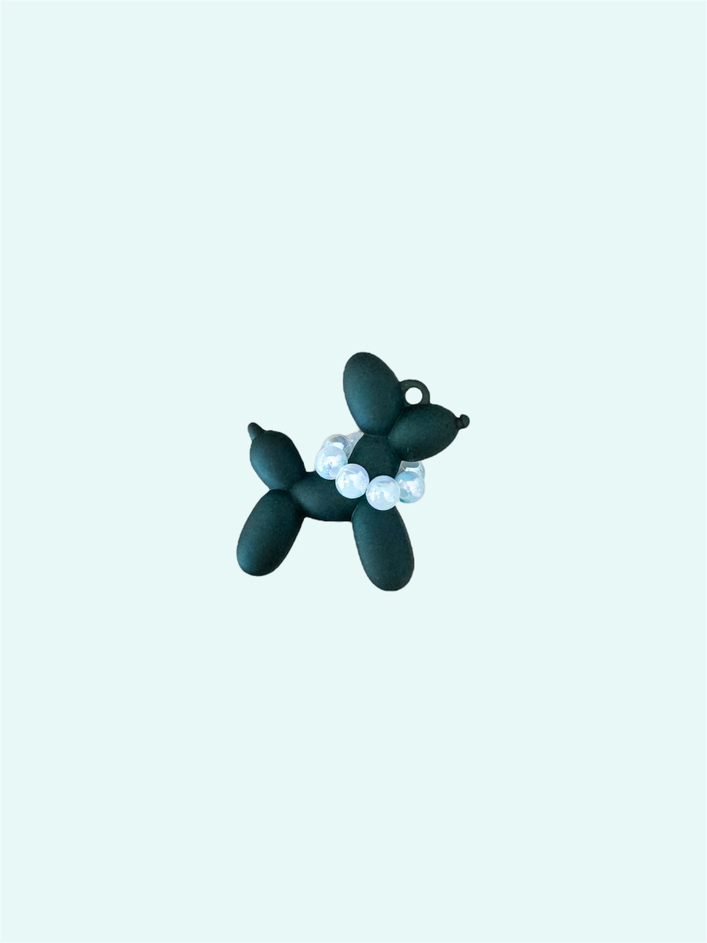Mini acrylic balloon dog keychain with clear elegant design, lightweight and portable, reflecting the joy and love shared with your dog.